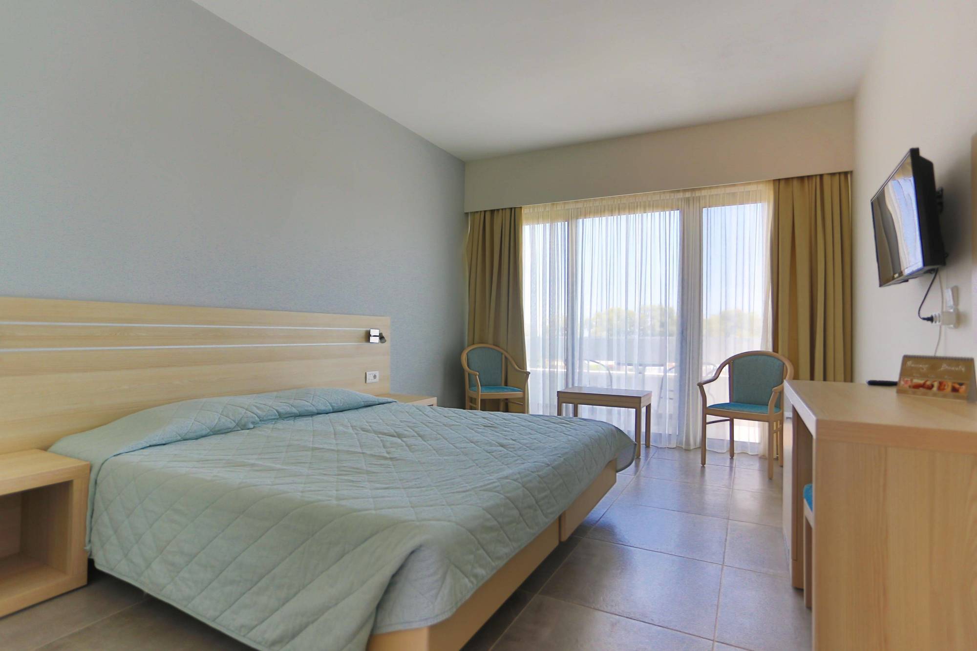 Hotel Niriides Beach Kolymbia Bagian luar foto